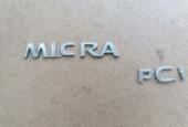 Thumbnail 2 van Embleem Nissan Micra III 1.2 Acenta ('03-'11) 90890 AX 600