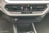 BMW 1-serie 118i AUTOMAAT/XENON/NAVI/CRUISE/SCHADE