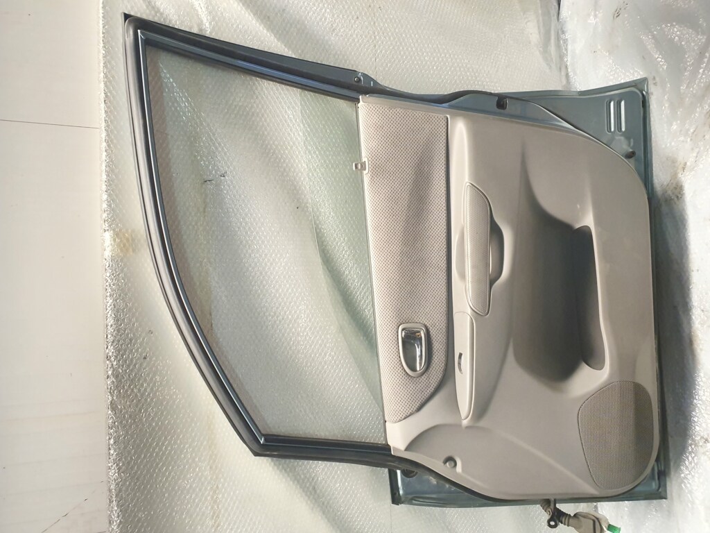 Afbeelding 2 van Portier Mazda Premacy 2.0 ('99-'05) r-voor blauw 5-deurs