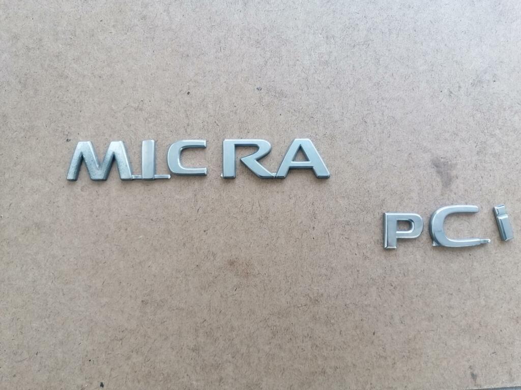 Afbeelding 2 van Embleem Nissan Micra III 1.2 Acenta ('03-'11) 90890 AX 600