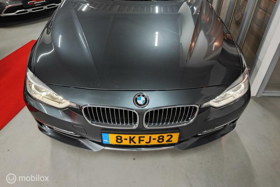 BMW 3-serie 335i AUT. LEER OPENDAK ELEK STOELEN CAMERA ACC CRUISE HEAD-UP STOELVERW PDC