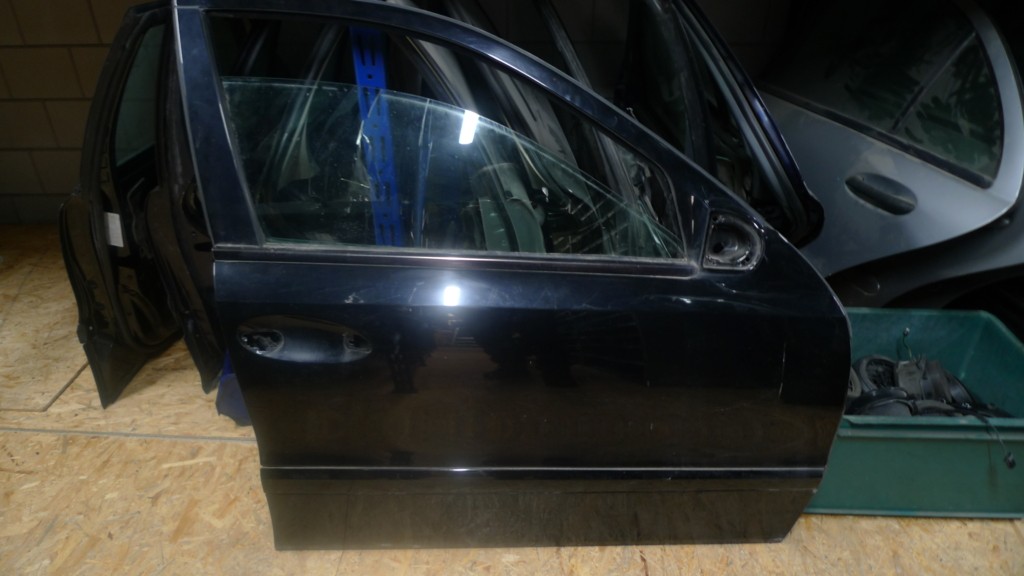 Portier Mercedes 211 r.v. 040U zwart A2117201405 o.t. tot eind 2006