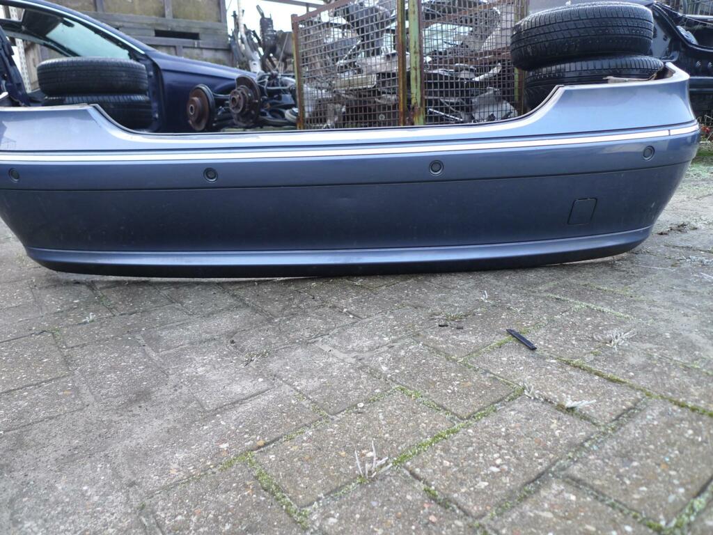 Achterbumper Mercedes 211 sedan o.t. 353U tealit blauw chroom + pts paar beschadigingkjes A2118800783 A2118803240