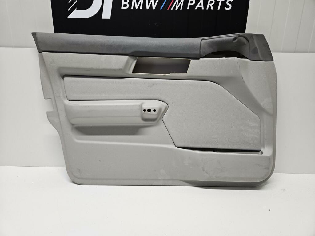 Deurpaneel linksvoor leder grijs BMW 5-serie E34